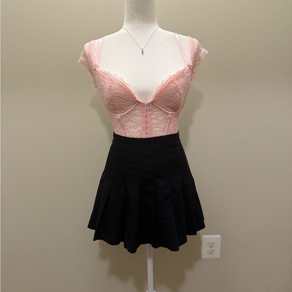 Brandy Melville black pleated skirt. size S